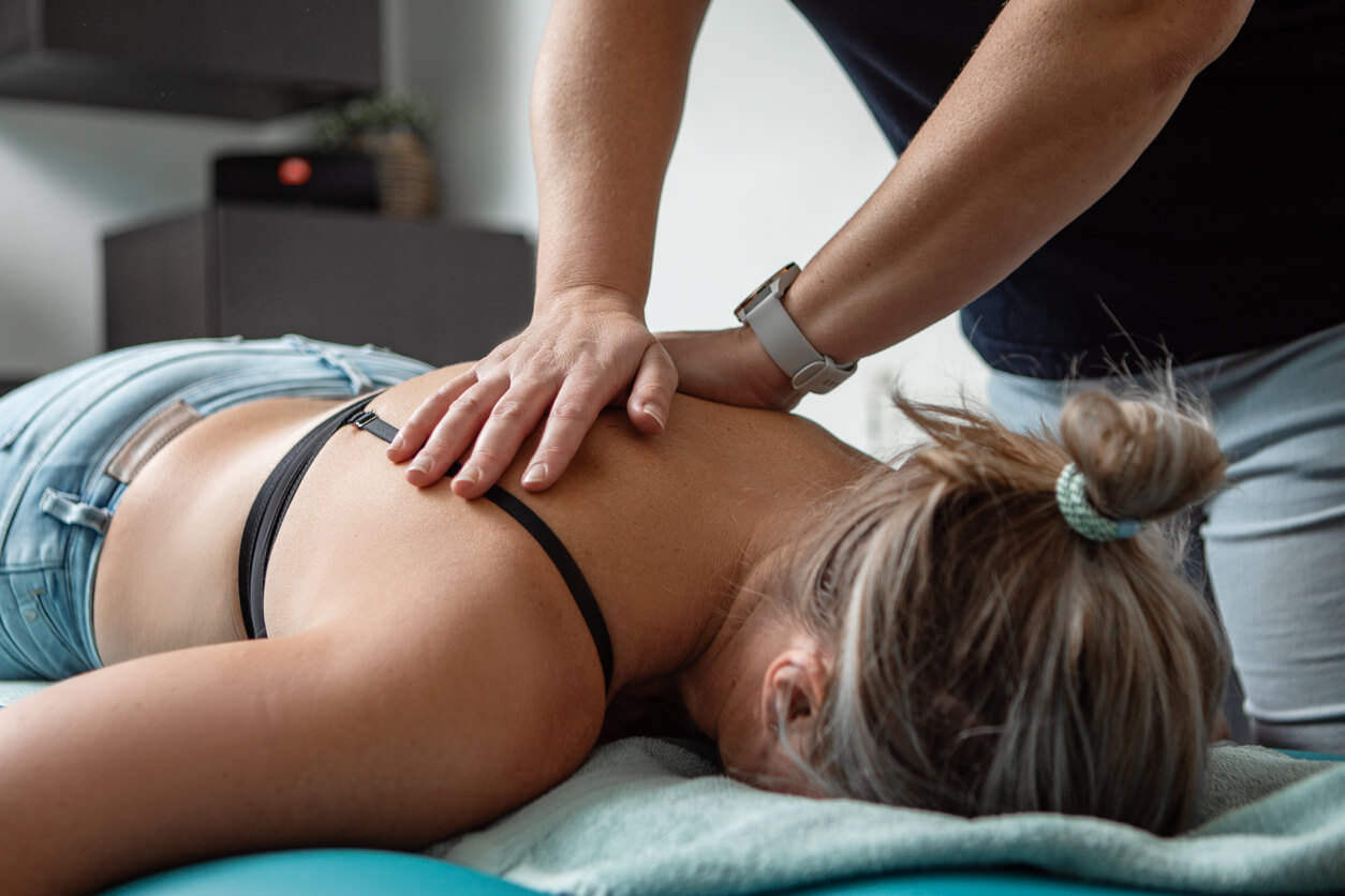 Marden Woman getting a back adjustment from professional Chiropractors for Marden